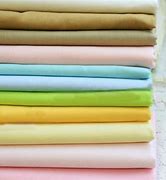 a pile of embroidery cottons in a range of colours