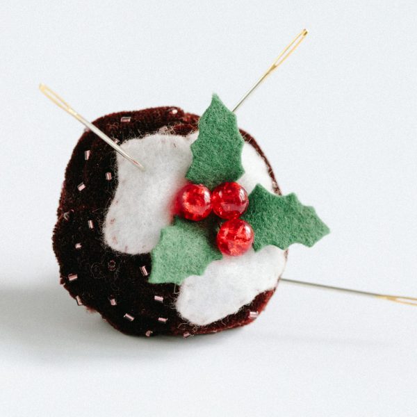 A pumice filled cotton velvet Christmas pudding with felt leaves